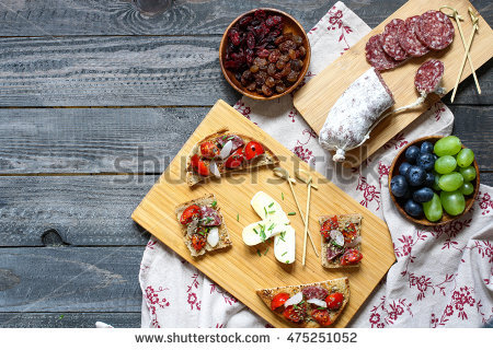 stock-photo-italian-bruschetta-made-with-toasted-slices-of-bread-with-olives-cherry-tomatoes-and-olive-on-a-475251052.jpg.611c6e55b0f97bf73da45f4f61cdedb8.jpg